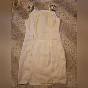 Elegant Cream Dress with Gold Accents